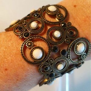 Vintage brass tone Wide Stretch Bracelet w/Black-White opaque rhinestones